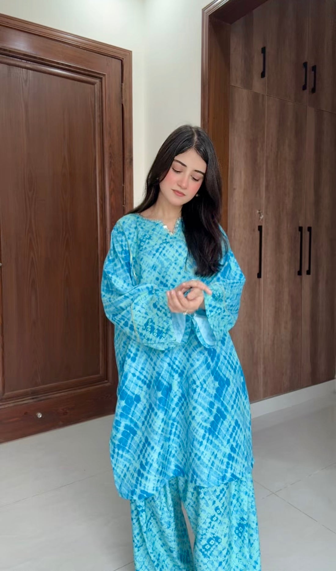 Teal bandhani kurta set with farshi shalwar for women, front view — Threads and Reels Pakistan
